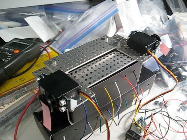 two Hitec HSR-1425CR continuous-rotation servos